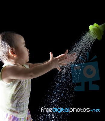 Baby Playing With Water Drop Stock Photo