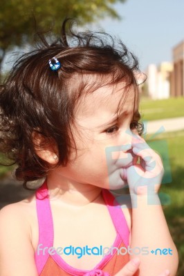 Baby Sucking Her Thumb Stock Photo