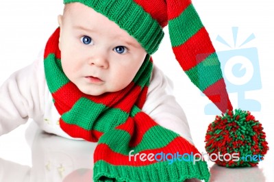 Baby With Christmas Hat And Scarf Stock Photo