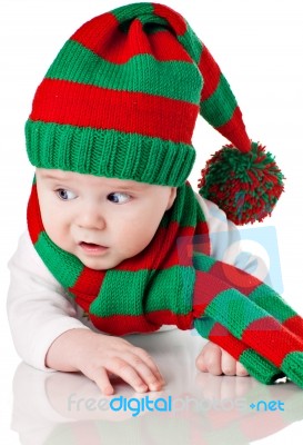 Baby With Christmas Hat And Scarf Stock Photo