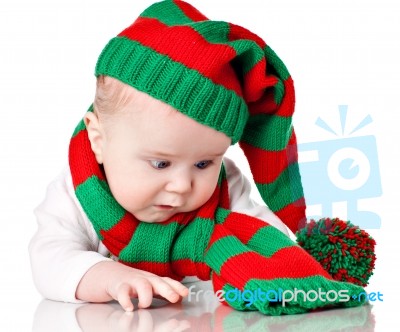 Baby With Christmas Hat And Scarf Stock Photo