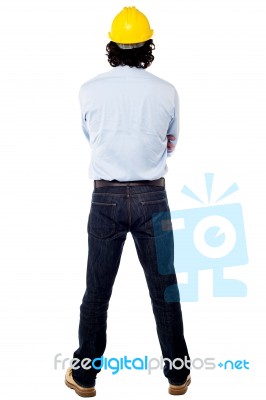 Back Pose Of A Engineer Wearing Hard Hat Stock Photo