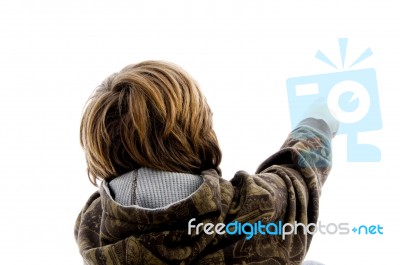 Back Pose Of Boy Pointing Stock Photo