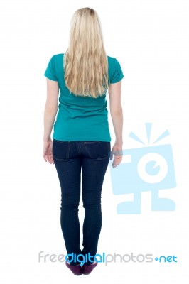 Back Pose Of Casual Young Female Stock Photo