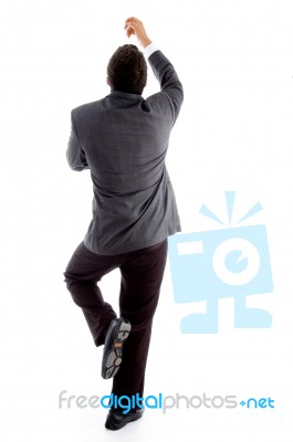 Back Pose Of Climbing Executive Stock Photo