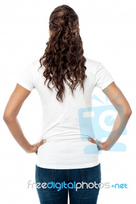 Back Pose Of Stylish Young Woman Stock Photo