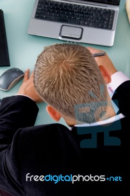 Back Pose Of Working Businessman Stock Photo