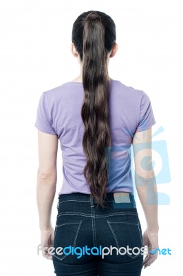 Back Pose Of Young Female Stock Photo