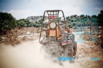 Back View Of Quad Bike Riders Stock Photo