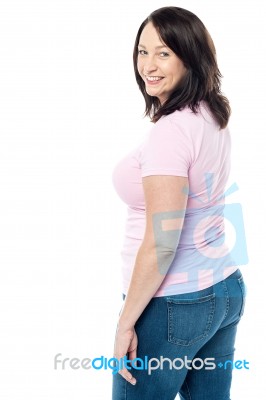 Back View Of Woman Looking Back Stock Photo