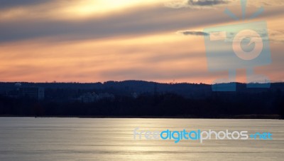 Background With A Beautiful Sunset On The Icy Lake Stock Photo