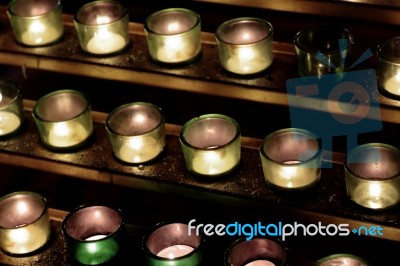 Background With The Beautiful Small Candles Stock Photo