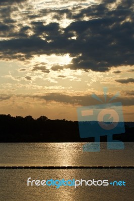 Background With The Beautiful Sunset On The Lake Stock Photo