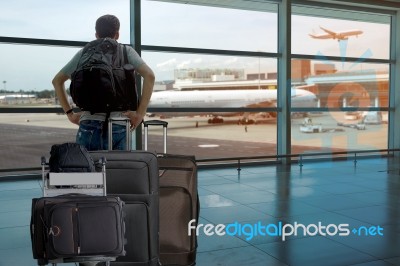 Backpack Passenger In The Airport Terminal Stock Photo