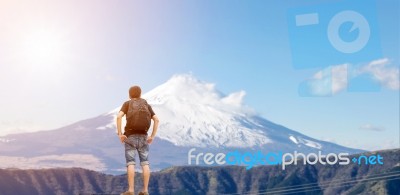 Backpacker Standing At The Mount Fuji Stock Photo