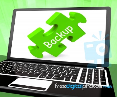 Backup Laptop Shows Data Archiving Back Up And Storage Stock Image