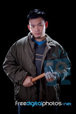 Bad Boy And Hammer In Hand Stock Photo