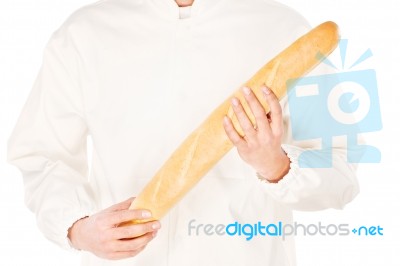 Baguette In A Hands Of A Backer Stock Photo