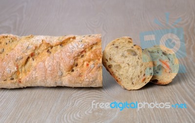 Baguette With Cereals Stock Photo