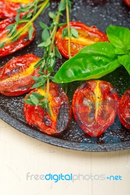 Baked Cherry Tomatoes With Basil And Thyme Stock Photo