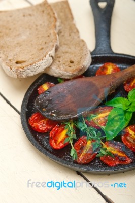 Baked Cherry Tomatoes With Basil And Thyme Stock Photo