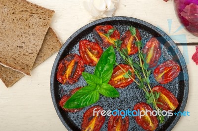 Baked Cherry Tomatoes With Basil And Thyme Stock Photo