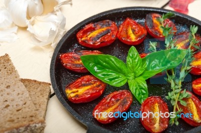 Baked Cherry Tomatoes With Basil And Thyme Stock Photo