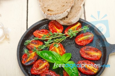 Baked Cherry Tomatoes With Basil And Thyme Stock Photo