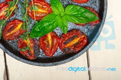 Baked Cherry Tomatoes With Basil And Thyme Stock Photo