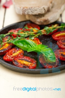 Baked Cherry Tomatoes With Basil And Thyme Stock Photo