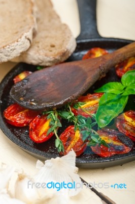 Baked Cherry Tomatoes With Basil And Thyme Stock Photo