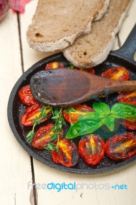 Baked Cherry Tomatoes With Basil And Thyme Stock Photo