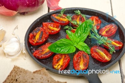 Baked Cherry Tomatoes With Basil And Thyme Stock Photo