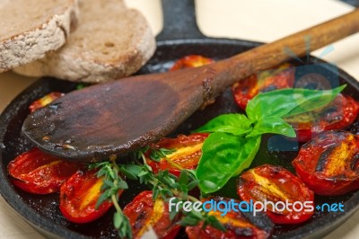 Baked Cherry Tomatoes With Basil And Thyme Stock Photo