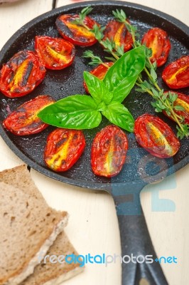 Baked Cherry Tomatoes With Basil And Thyme Stock Photo