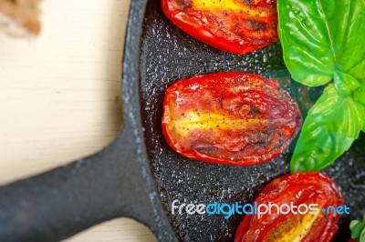 Baked Cherry Tomatoes With Basil And Thyme Stock Photo