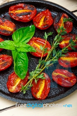 Baked Cherry Tomatoes With Basil And Thyme Stock Photo