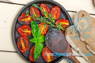 Baked Cherry Tomatoes With Basil And Thyme Stock Photo