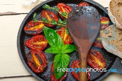 Baked Cherry Tomatoes With Basil And Thyme Stock Photo