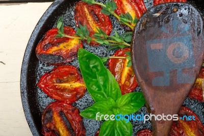 Baked Cherry Tomatoes With Basil And Thyme Stock Photo