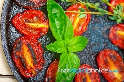 Baked Cherry Tomatoes With Basil And Thyme Stock Photo