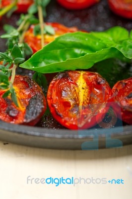 Baked Cherry Tomatoes With Basil And Thyme Stock Photo