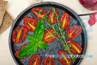 Baked Cherry Tomatoes With Basil And Thyme Stock Photo