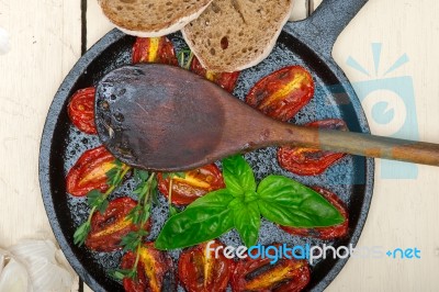 Baked Cherry Tomatoes With Basil Anf Thyme Stock Photo