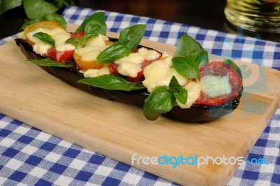 Baked Eggplant With Tomatoes And Cheese Stock Photo