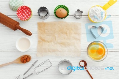 Baking Background With Baking Paper And Ingredients Stock Photo