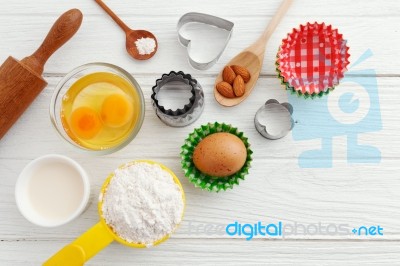 Baking Ingredients On Wooden Table Stock Photo