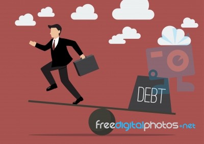 Balancing. Businessman And Debt Stock Image