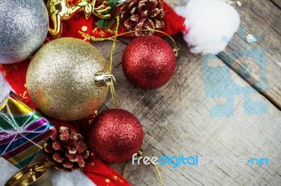 Ball And Gift On Wooden Stock Photo