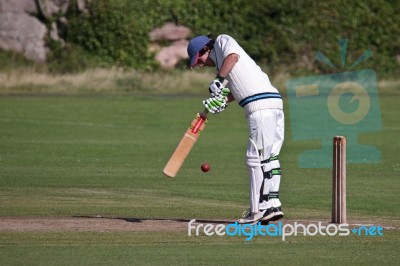 Bamburgh, Northumberland/uk - August 15 : Playing Cricket On The… Stock Photo